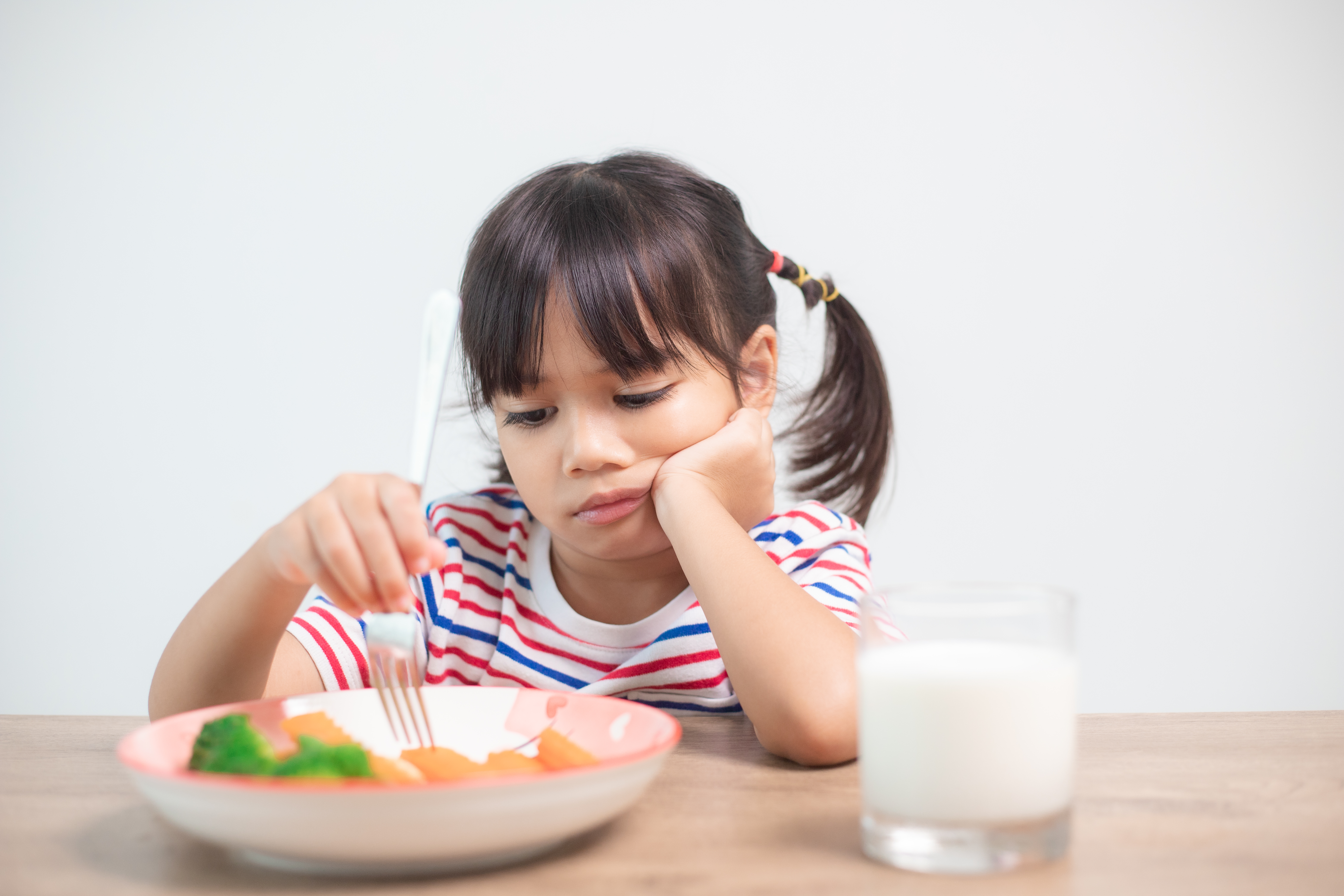 Nutrition healthy eating habits for kids concept. Children do not like to eat vegetables.