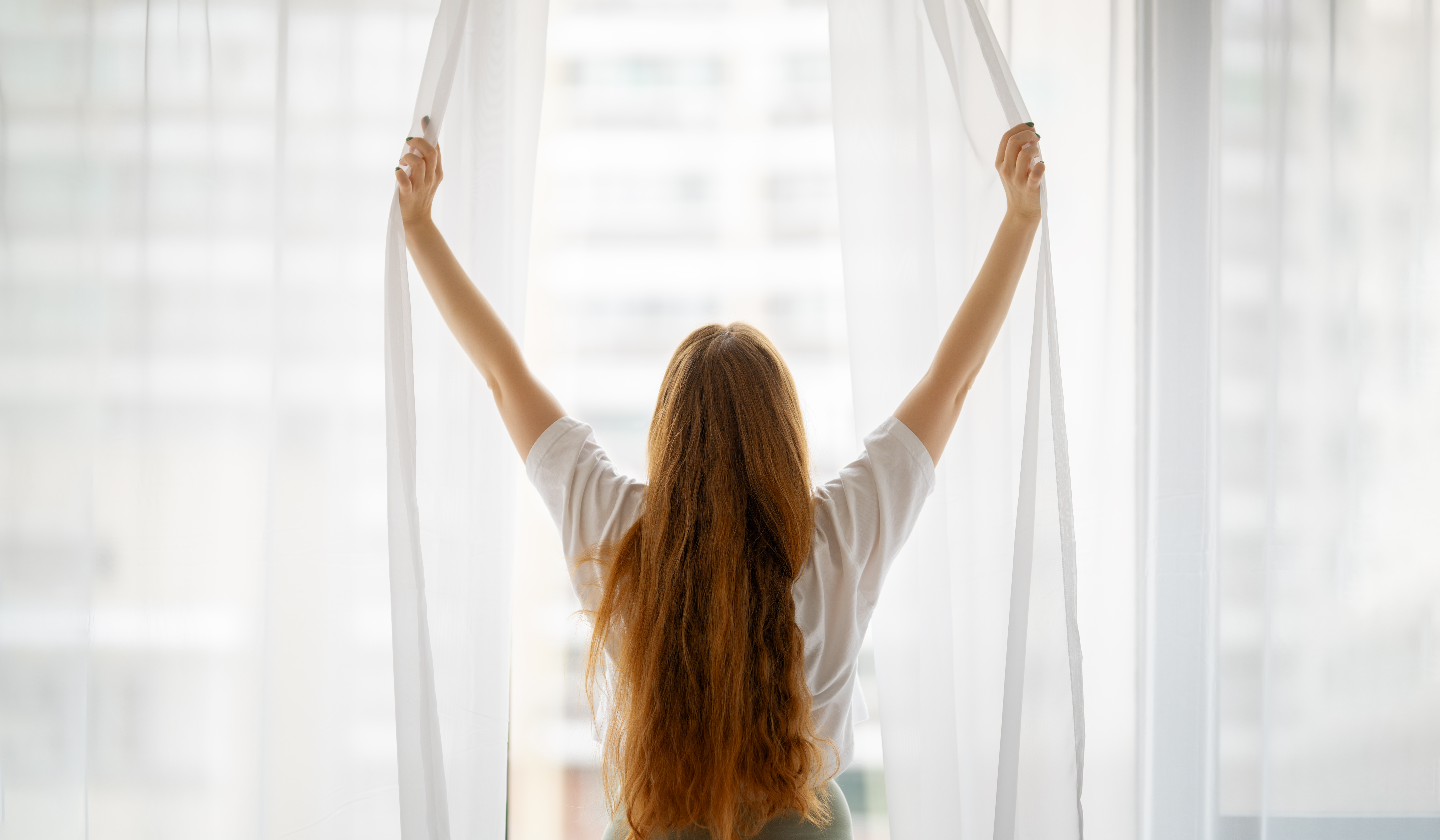 Woman opening the window